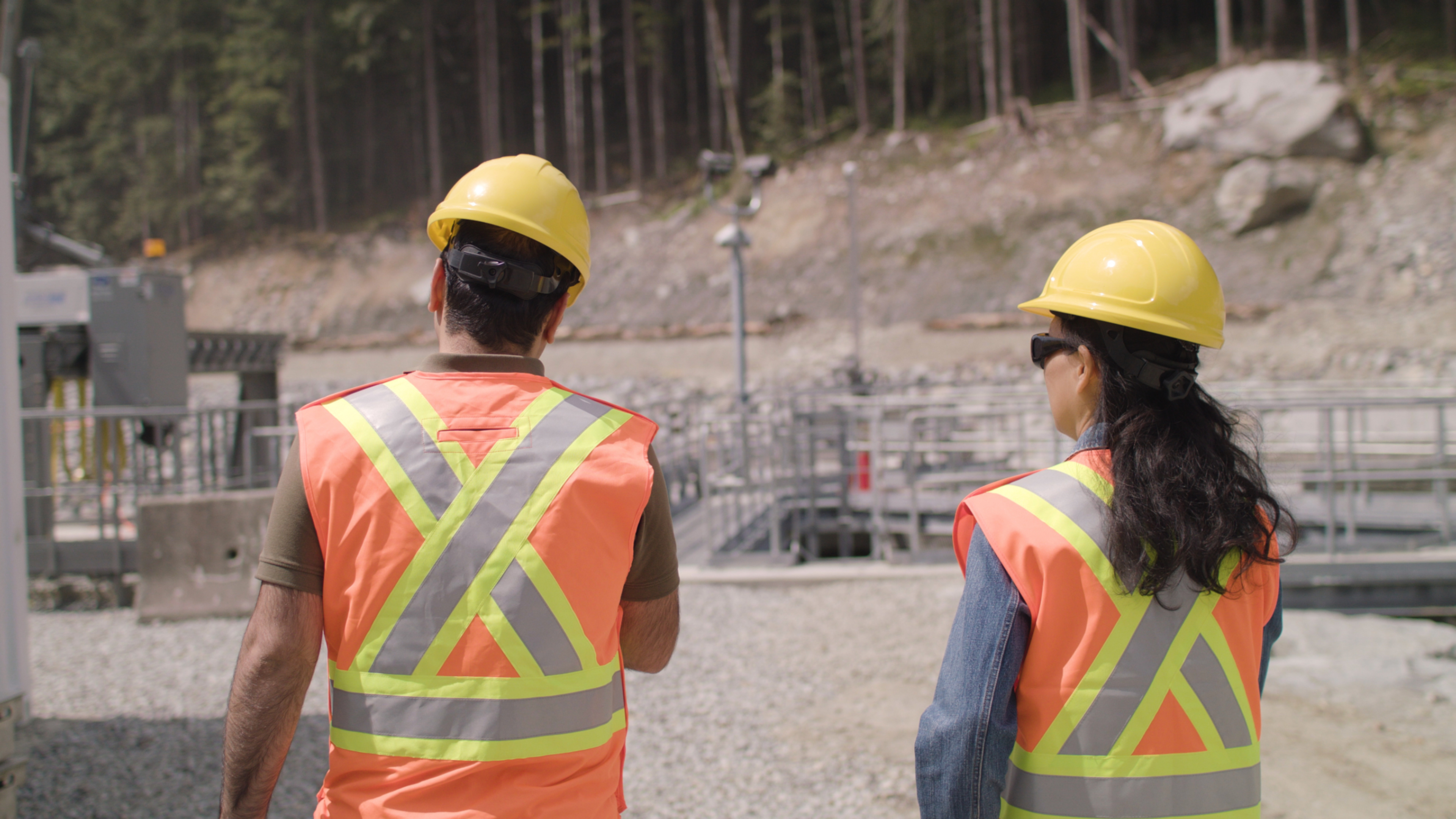 Hydropower plant - Two employees walking