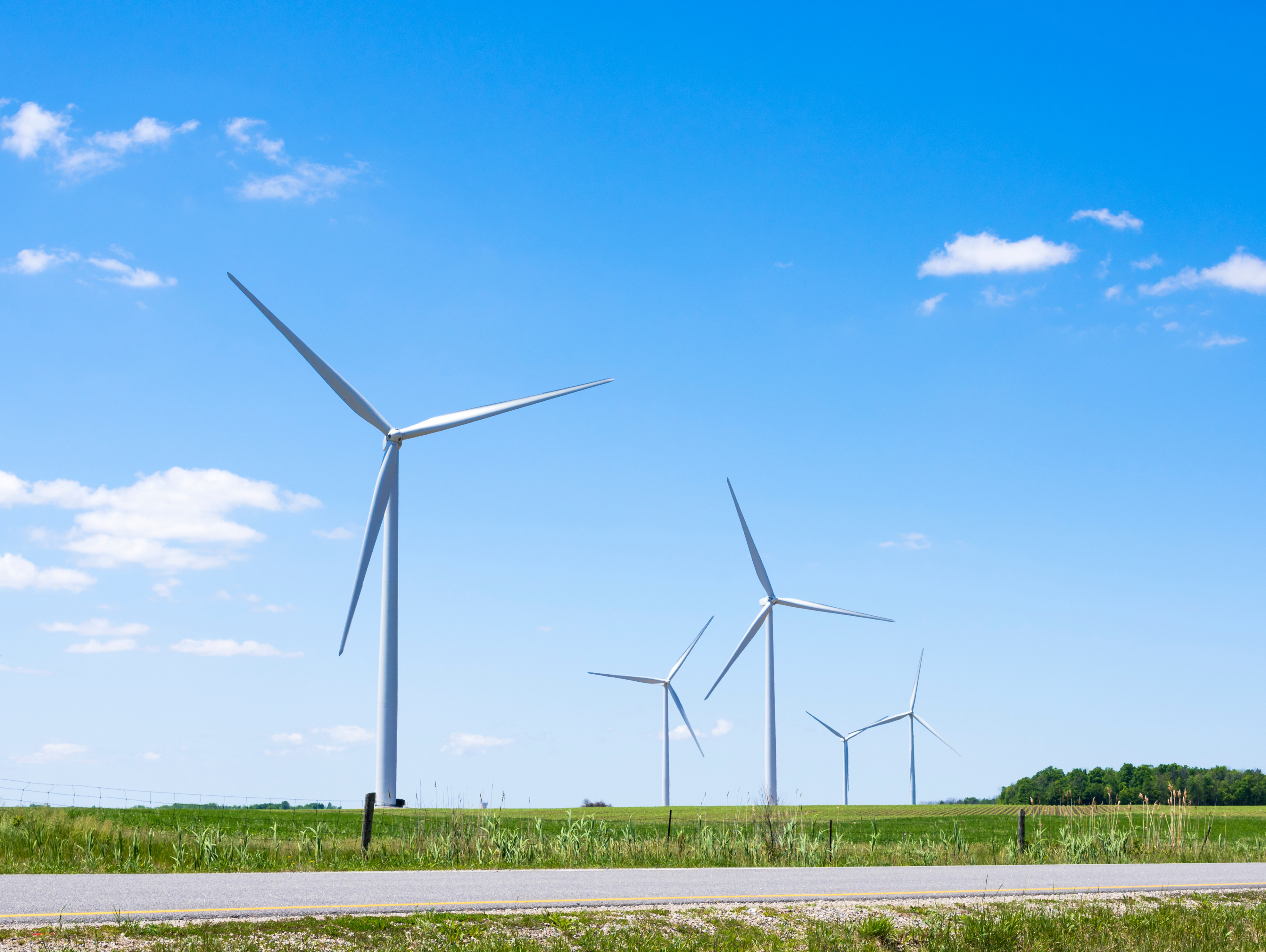 Pr wind farm landscape turbine field blue sky hz lr