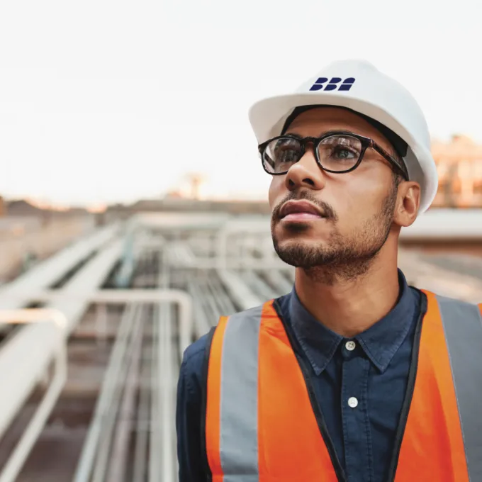 Man on construction site engineering