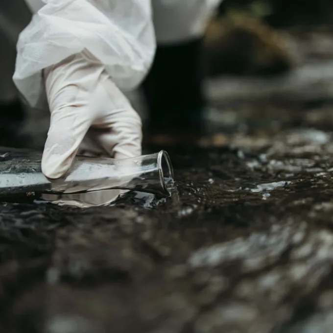 Environment Studies - Person taking samples in river